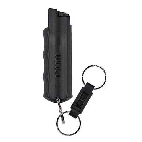 Hand-held pepper spray with twist lock safety and quick release keyring